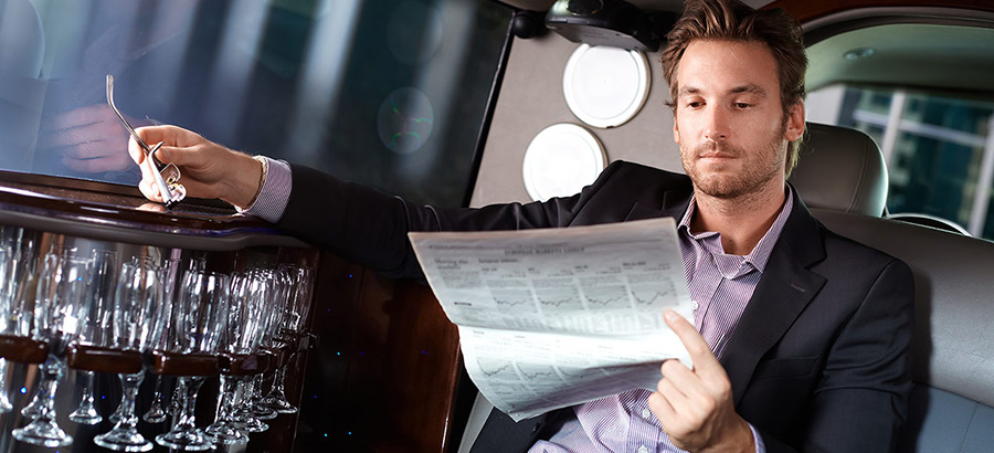 Men relaxing in a Limo Vehicle